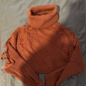 Burnt orange cropped turtleneck sweater